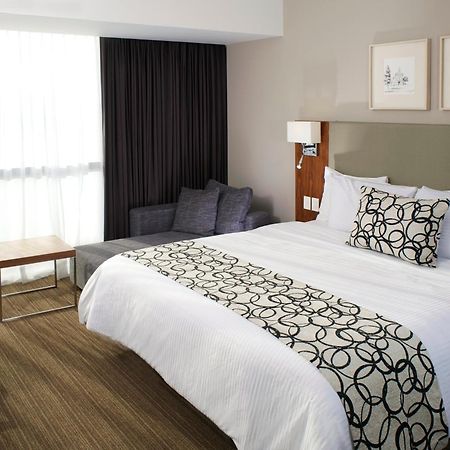 Casa Inn Premium Hotel Queretaro Miranda Exteriér fotografie A bed runner