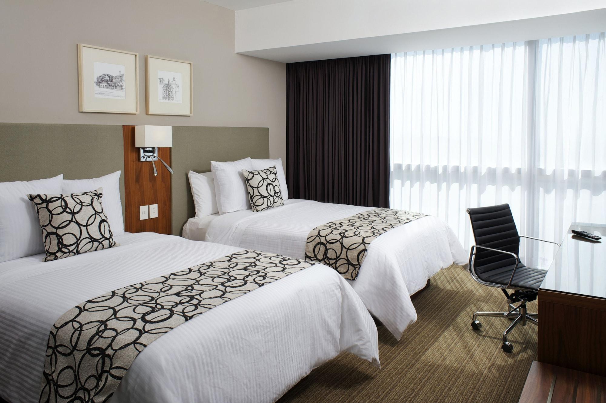 Casa Inn Premium Hotel Queretaro Miranda Exteriér fotografie A room at the hotel